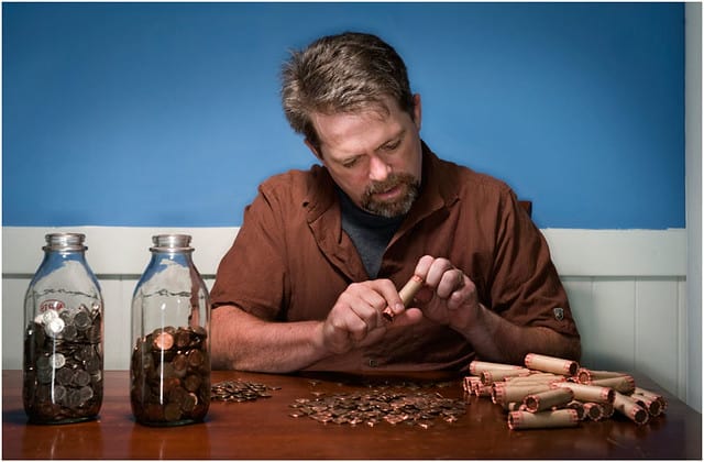 [J.D., Counting His Money]