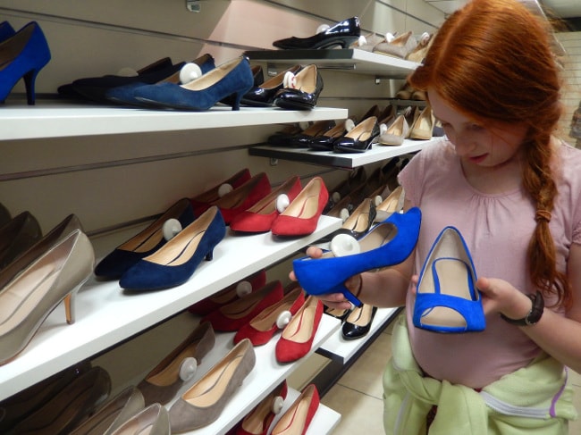 Girl shopping for shoes